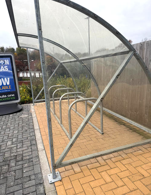 Bespoke bike shelter with curved glazed canopy Bespoke bike shelter with curved glazed canopy